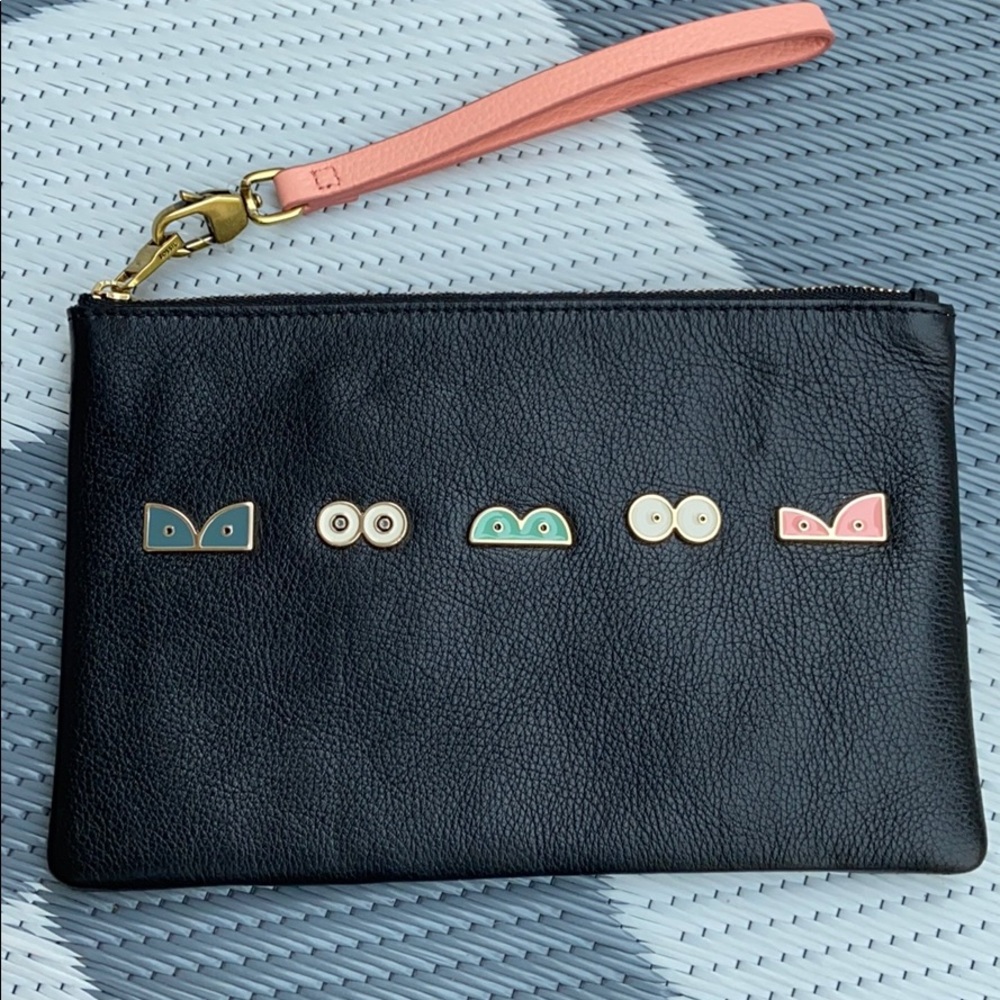 Fossil leather pouch
